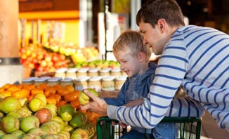 Teach your kids about fruit at a Tropical North Queensland farmer's market. 